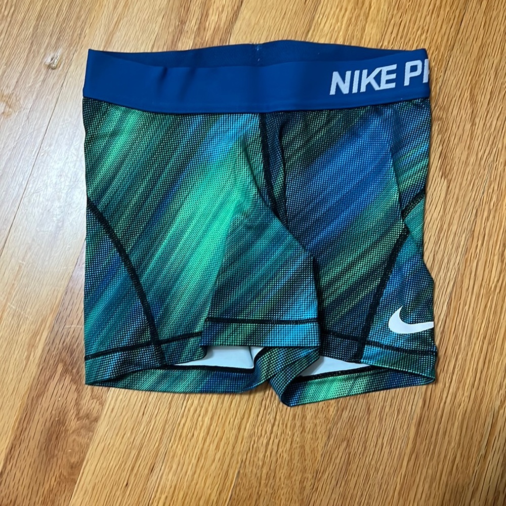 BARELY WORN GREEN AND BLUE NIKE PROS